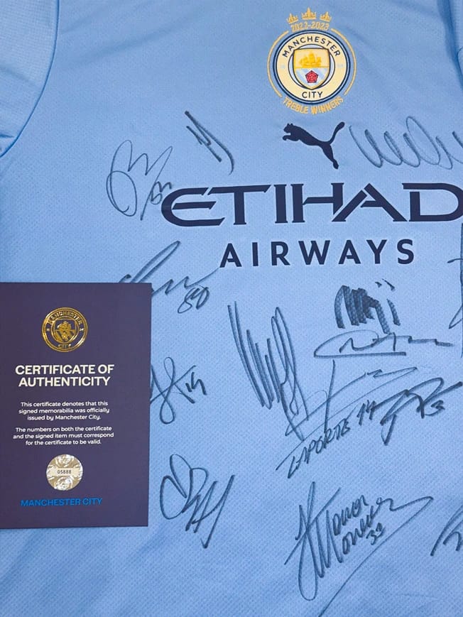 MANCHESTER CITY 2022/23 SQUAD SIGNED JERSEY - 10