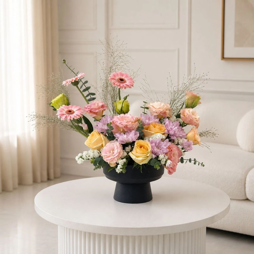 Mix of pink and yellow in black vase - 1