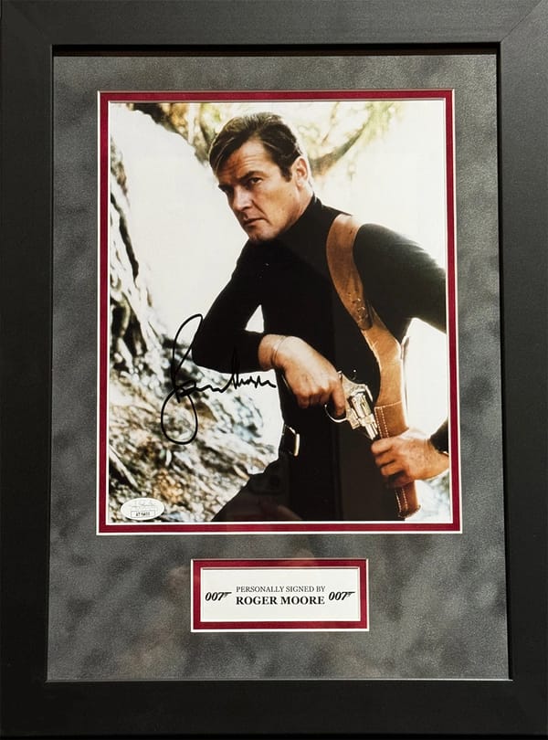 Roger Moore Signed "007" framed Poster (JSA)