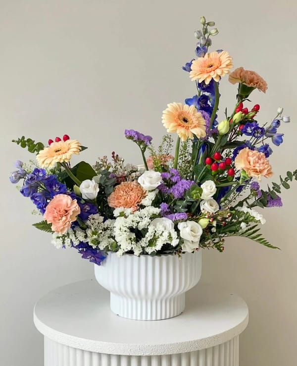vase with assorted flowers